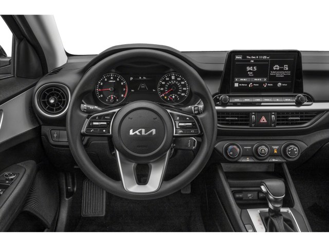 Interior view of the steering wheel and dashboard area of a 2024 Kia Forte. | Kia dealer in Altoona, PA | Altoona Courtesy Kia