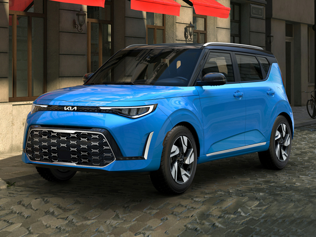 A bright electric blue 2024 Kia Soul parked in front of a building. | Kia dealer in Altoona, PA | Altoona Courtesy Kia